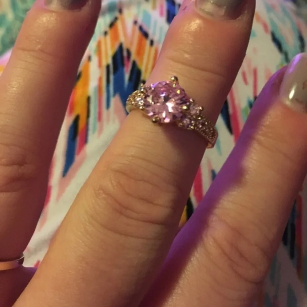 Woman’s Pink sapphire ring Gold Tone size 8